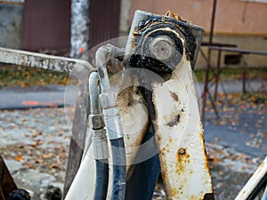 Hydraulic hoses on excavator`s arm close up shot