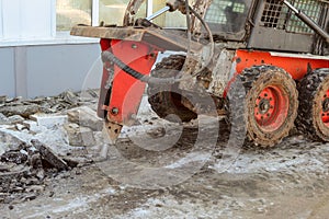 Hydraulic jack hammer destroy crushes frozen asphalt