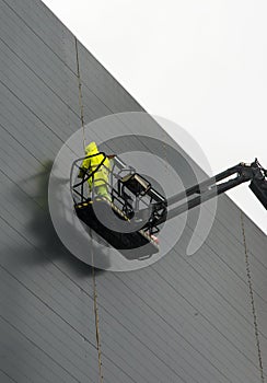 Hydraulic lift with worker.