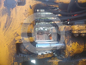 Hydraulic lines with connections on a backhoe