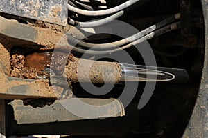 Hydraulic pistons and pipes of a large bulldozer