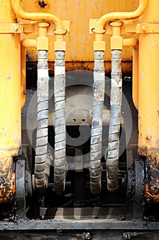 Hydraulic system to working crawler excavator for road repair. Russia. Reportage shooting.