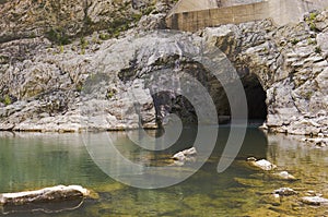 Hydro dam spillway and bypass tunnel