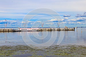 Hydrofoil boats moored at open coast of Gulf of Finland, in Peterhof suburb of St. Petersburg, Russia