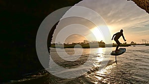 Hydrofoil rider gliding over the water