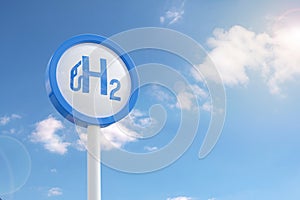 Hydrogen fuel logo sign on blue sky background with copy space. 3d illustration