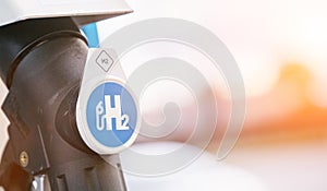 Hydrogen logo on gas stations fuel dispenser - h2 combustion engine for emission free eco