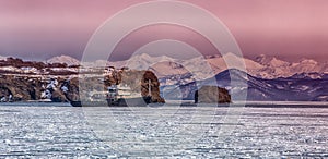 Hydrological vessel off the coast of the Kamchatka peninsula in Avacha Bay at sunset