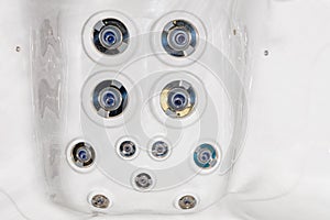 Hydromassage nozzles in a therapeutic spa, close-up