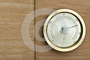 Hydrometer on wooden background