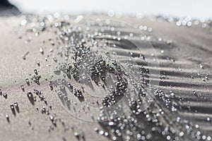 Hydrophobic rain water droplets forming beads on a waterproof pa photo