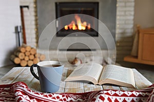Hygge concept with open book photo
