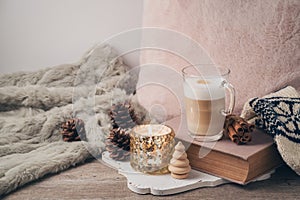 Hygge Scandinavian style concept with latte macchiato coffee cup