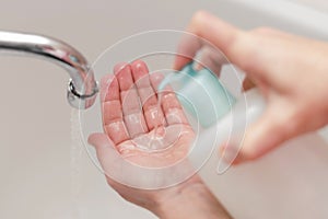 Hygiene. Cleaning Hands. Washing hands on sink