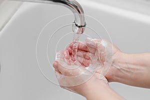 Hygiene. Cleaning Hands. Washing hands on sink