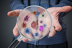 Hygiene concept. Man is showing dirty hands with many viruses and germs photo