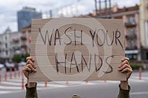 Hygiene demand. Wash your hands sign outside. agitation stick to healthy lifestyle.