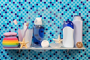 Hygiene products on shelf in bathroom