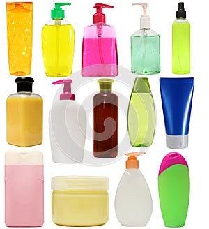 Hygiene Sanitizer colored plastic bottles with liquid soap and shower gel isolated on white background . Studio shooting