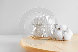 Hygienic cotton ear buds in glass cup