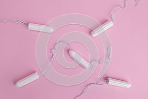 Hygienic female tampon on a pink background