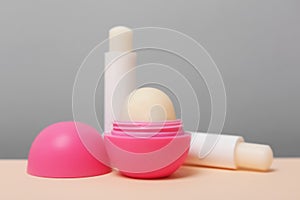 Hygienic lipsticks and balms on table