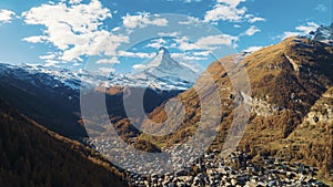 Hyper lapse or drone time lapse aerial view of Zermatt village in autumn