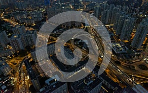 Hyper-lapse mode of crowded houses, road and traffic from day to night in Hong Kong