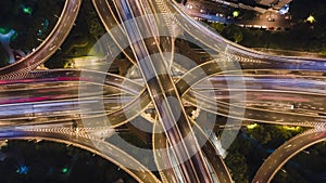 Hyper lapse Rising Drone Shot View Elevated Highway Roads, Bridges, in Night Shanghai