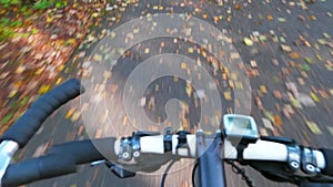Hyperlapse POV view of biker. One caucasian children ride bike road in autumn park. Rdding black white mtb cycle