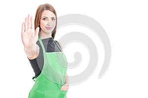 Hypermarket employee doing restriction gesture