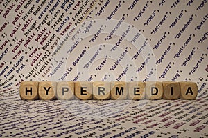 Hypermedia - cube with letters and words from the computer, software, internet categories, wooden cubes