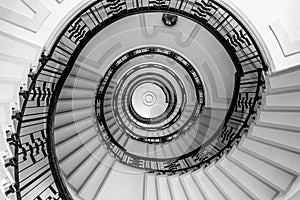 Hypnotic pattern of a spiral staircase, monochrome