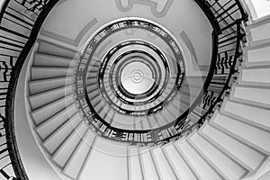 Hypnotic pattern of a spiral staircase, monochrome