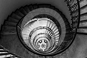 Hypnotic pattern of a spiral staircase, monochrome