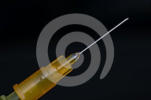 Hypodermic needle isoated on black background