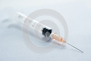 Hypodermic needleinjection needle on white background.