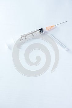 Hypodermic needleinjection needle on white background.