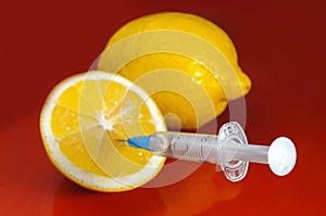 Hypodermic syringe. Syringes with blue needles on a red background. Medical Injectors.