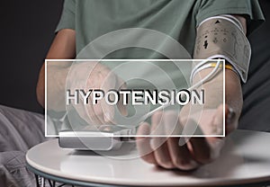 Hypotension word, low blood pressure concept