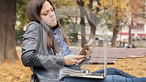 Hysterical girl with too many screens, mobils, tablets and laptops