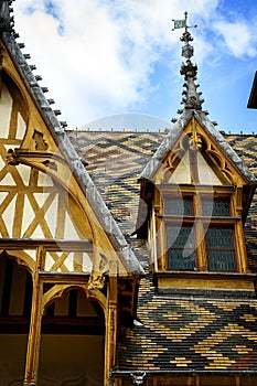 The Hospices of Beaune historic hospital, with visitors, in Beaune, Burgundy, France