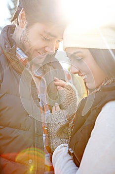 I adore you. Closeup shot of a loving young couple being affectionate while standing together in the outdoors.