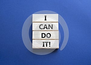 I can do it symbol. Concept words I can do it on wooden blocks. Beautiful deep blue background. Business and I can do it concept.