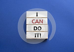 I can do it symbol. Concept words I can do it on wooden blocks. Beautiful deep blue background. Business and I can do it concept.