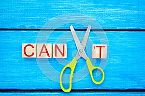 I can self motivation - cutting the letter t of the written word I can`t so it says I can, goal achievement, potential, overcomin