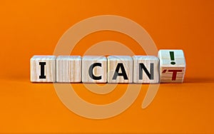 I can symbol. Turned a cube and changed the words `i can`t` to `i can`. Beautiful orange background. Concept of business visi