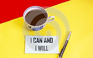 I can and will i word written on a sticker with a cup of coffee