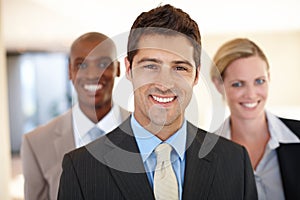 I chose a job thats just perfect for me. smiling businesspeople looking pleased in the office.