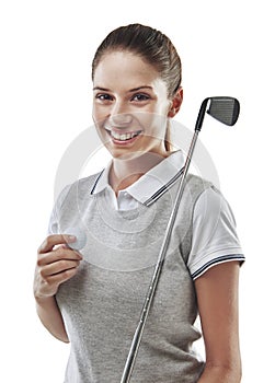 I could go for another round. Studio shot of a young golfer holding a golf ball and iron club isolated on white.